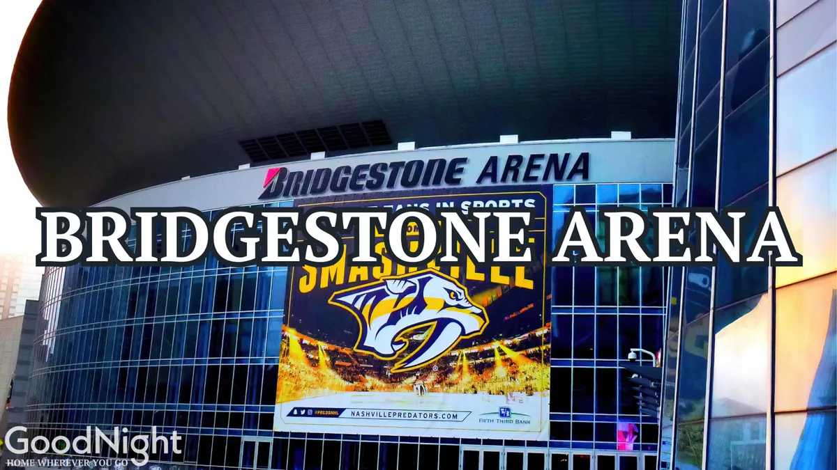 The striking exterior of Bridgestone Arena, featuring its bold signage and modern architecture. The arena is bustling with activity, ready to host major concerts and sporting events.